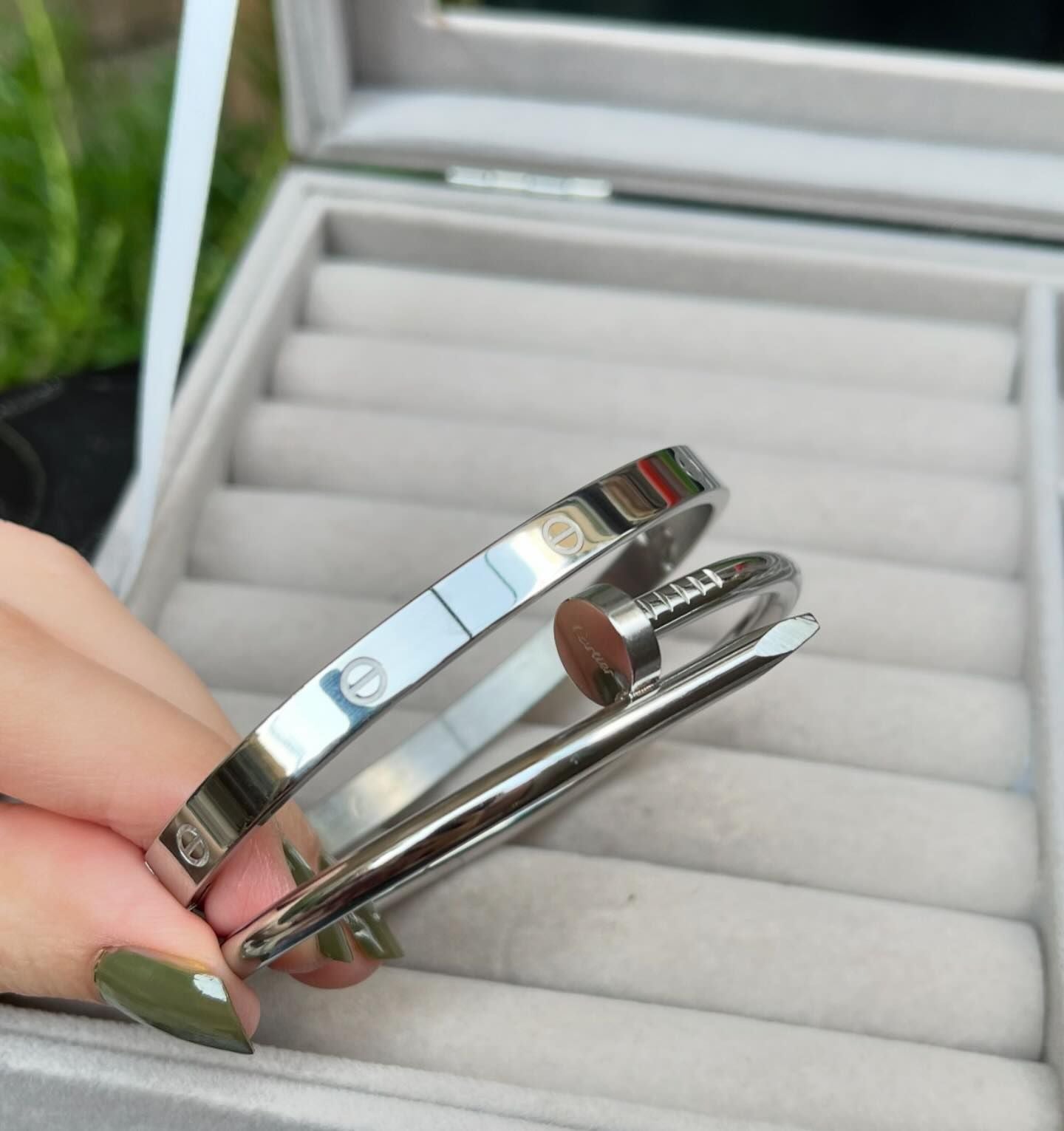 cartier love and nail bangle stack