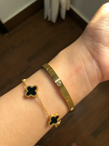 Cartier Love bangle with Black clover bracelet