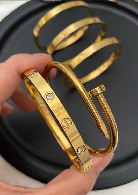 cartier love and nail bangle stack