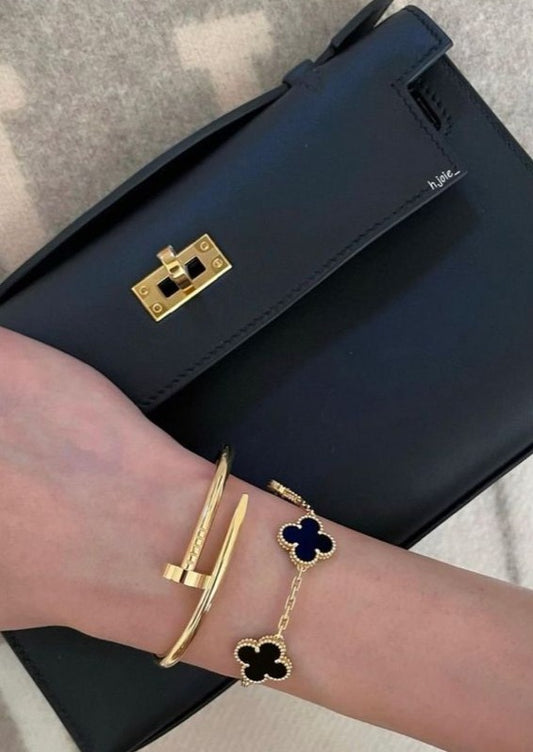 Cartier Nail bangle with Black clover bracelet