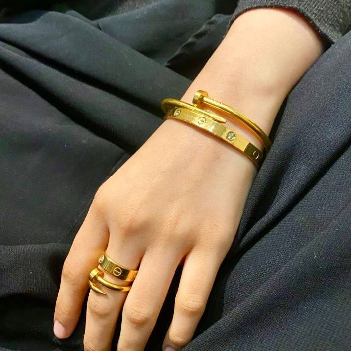 Cartier Nail and love bangle with rings stack