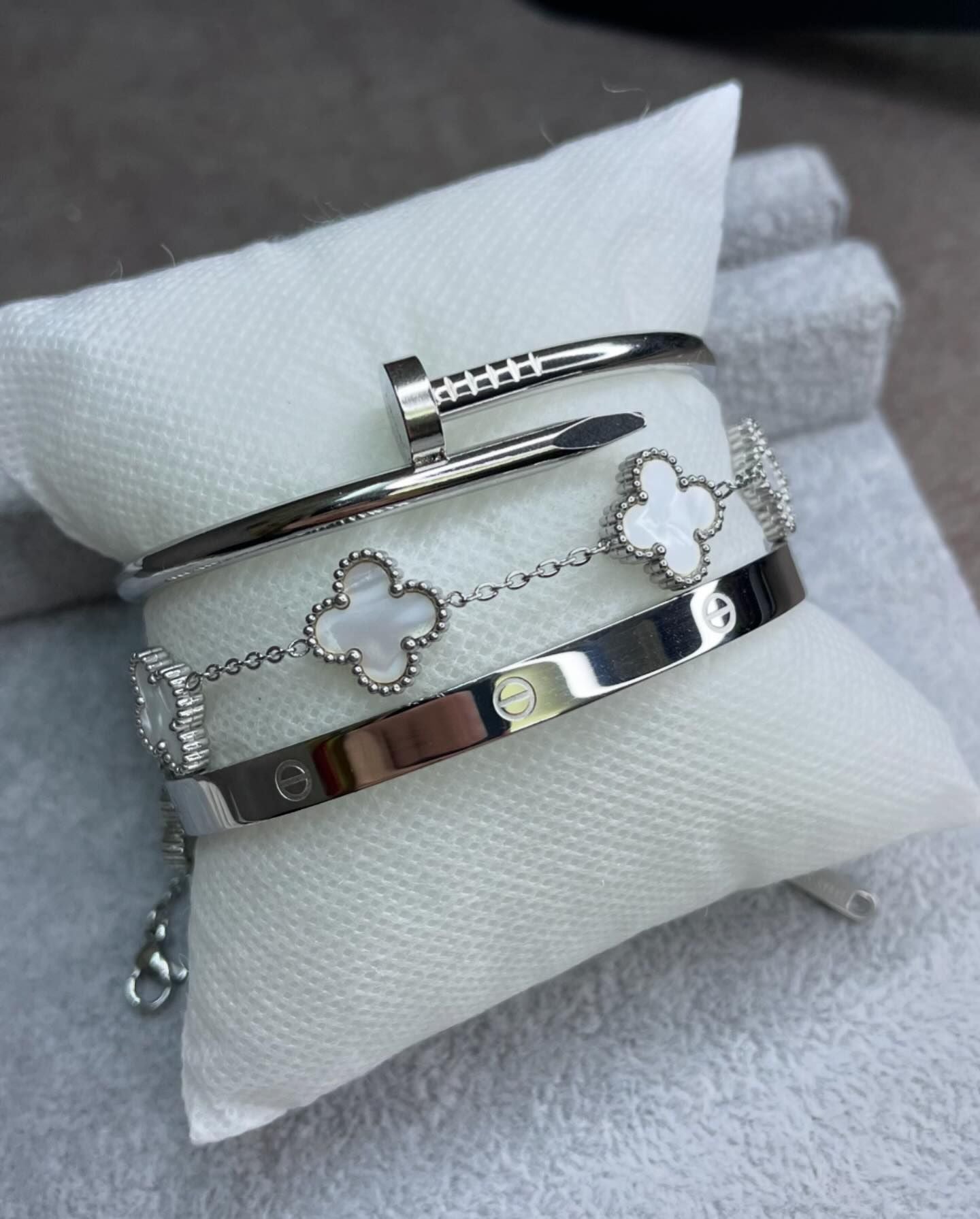 Silver Cartier Nail and love bangle with white clover bracelet